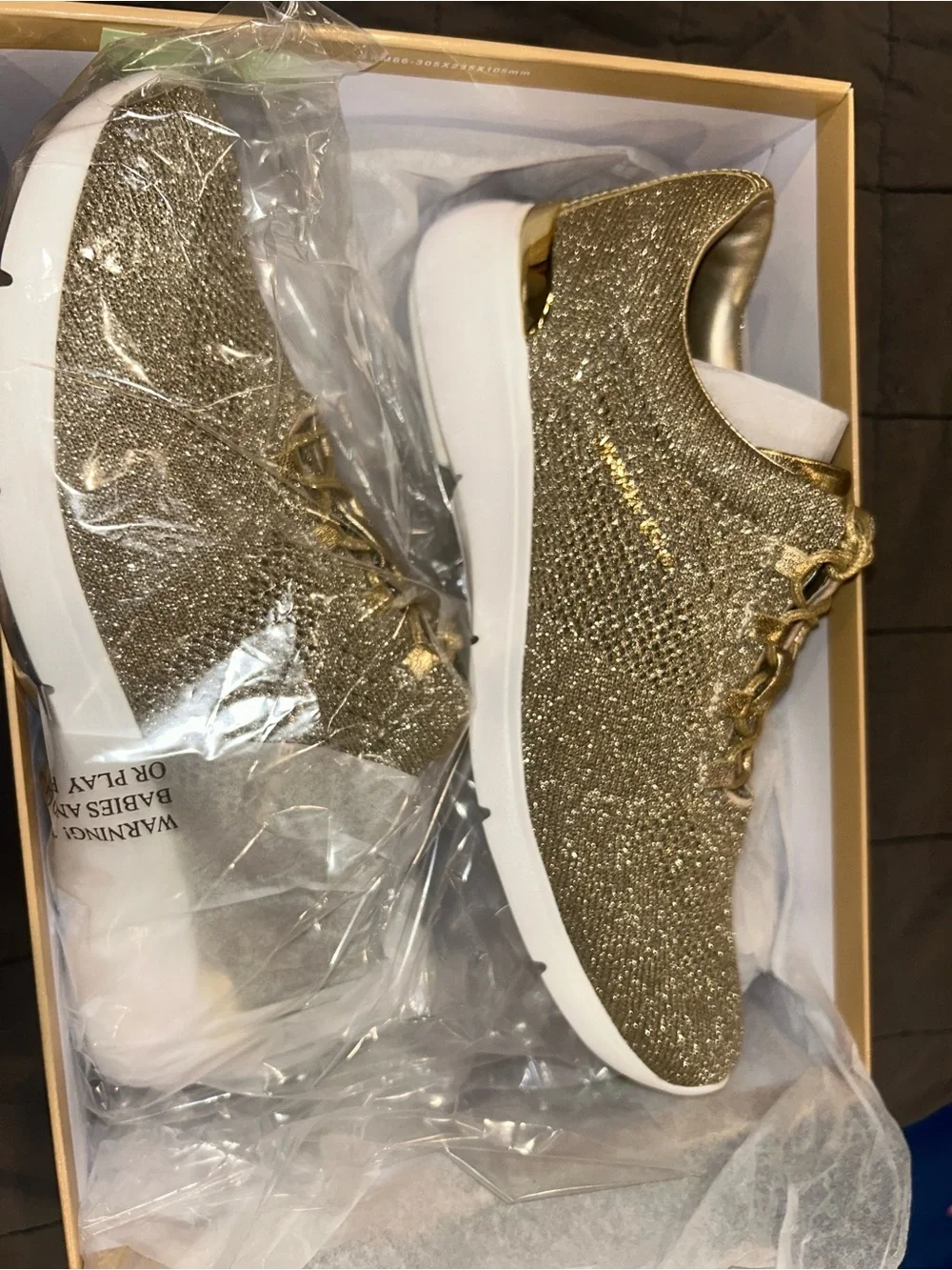 Michael Kors “Skyler” trainer sneakers pale gold 8.5